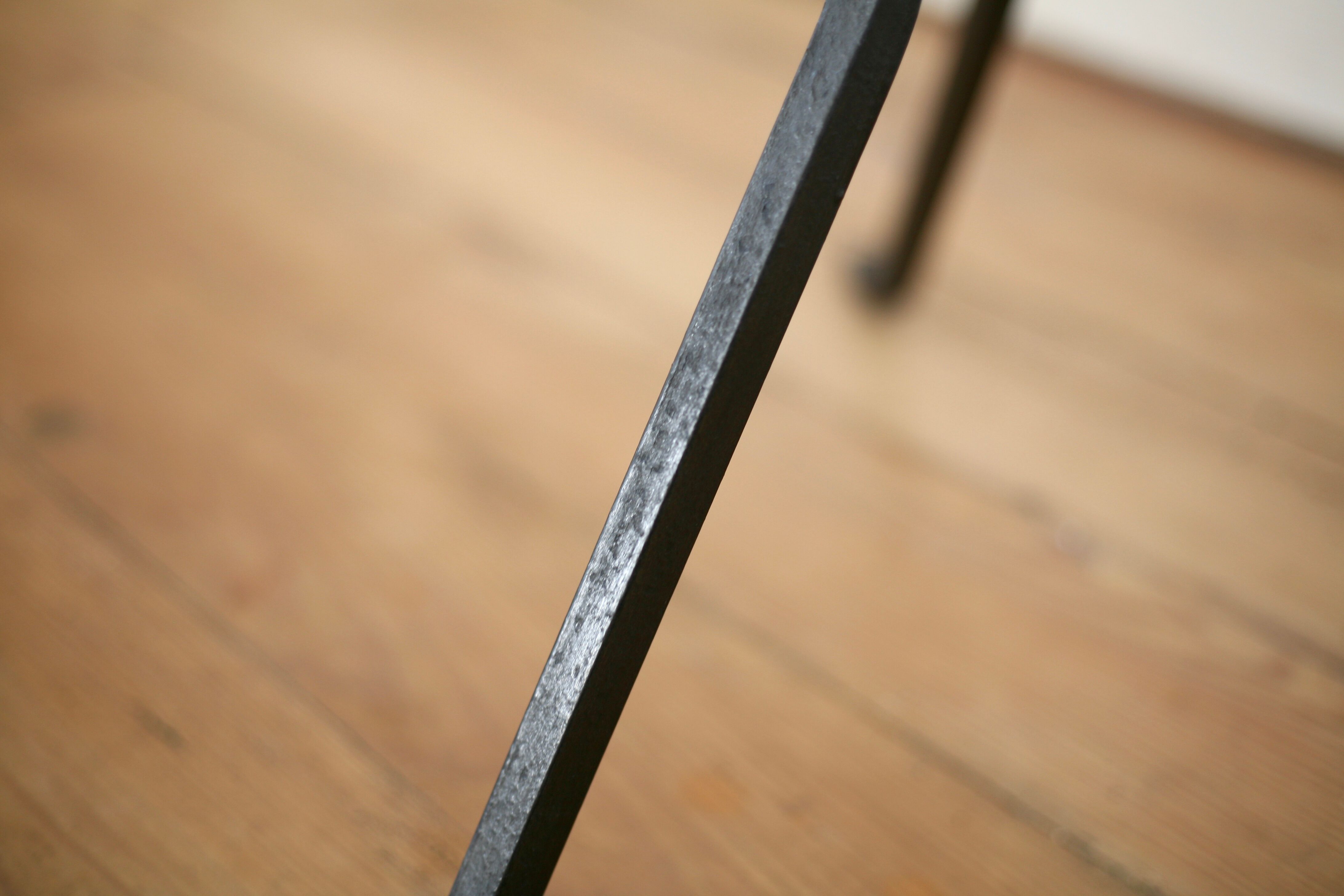 Coffee table black lacquered metal, glass and brass, France, circa 1950.