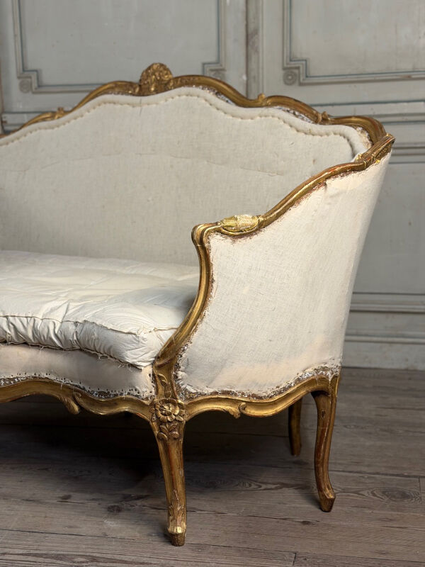 Banquette corbeille Louis XV en bois sculpté doré, XVIIIème siècle