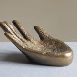 Empty-pocket brass hand