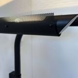 Pair of vintage wall lights, tubular and perforated black metal, Parscot France 1980