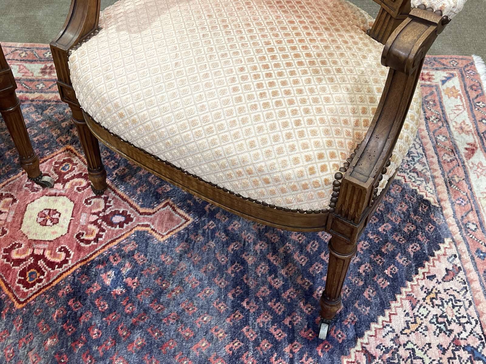 Pair of early 20th century Louis XVI armchairs in walnut