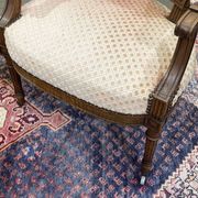 Paire de fauteuils Louis XVI début XXème en noyer