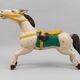 Pair of large hand-painted Indonesian horses with saddle
