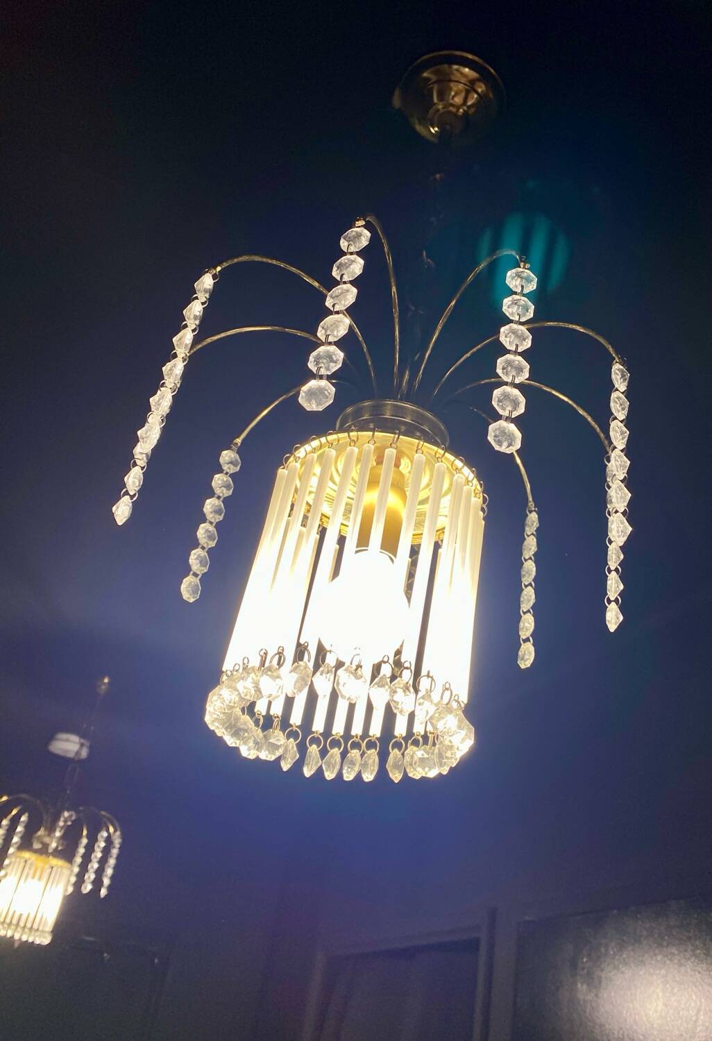 Duo of tassel chandeliers