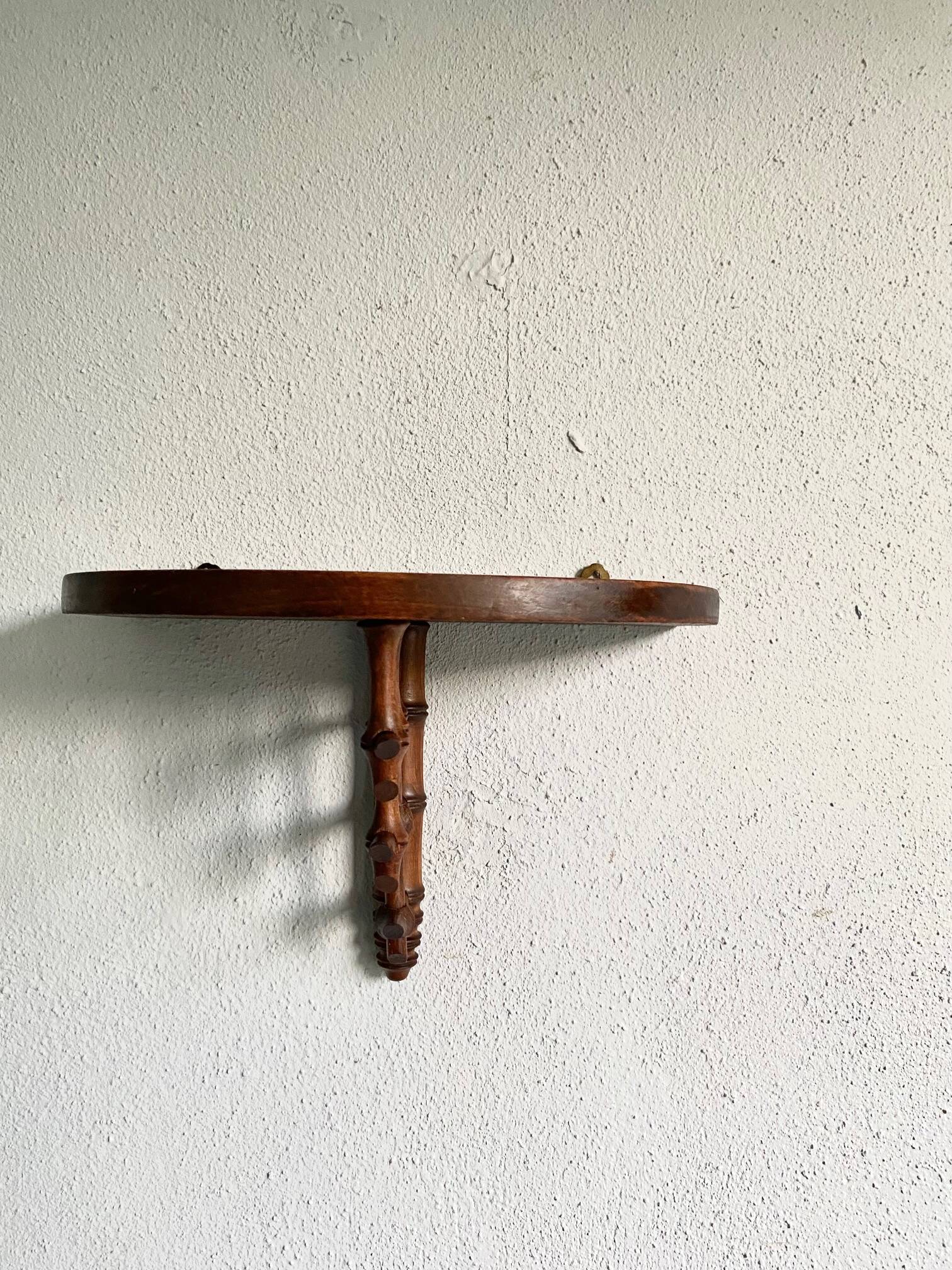 Wooden wall shelf, bamboo sculpture