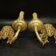 Pair of wall sconces with grotesque heads in 19th-century Renaissance style - bronze