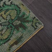 Vintage green and olive Turkish rug with a medallion, hand-knotted, 160 x 262 cm.