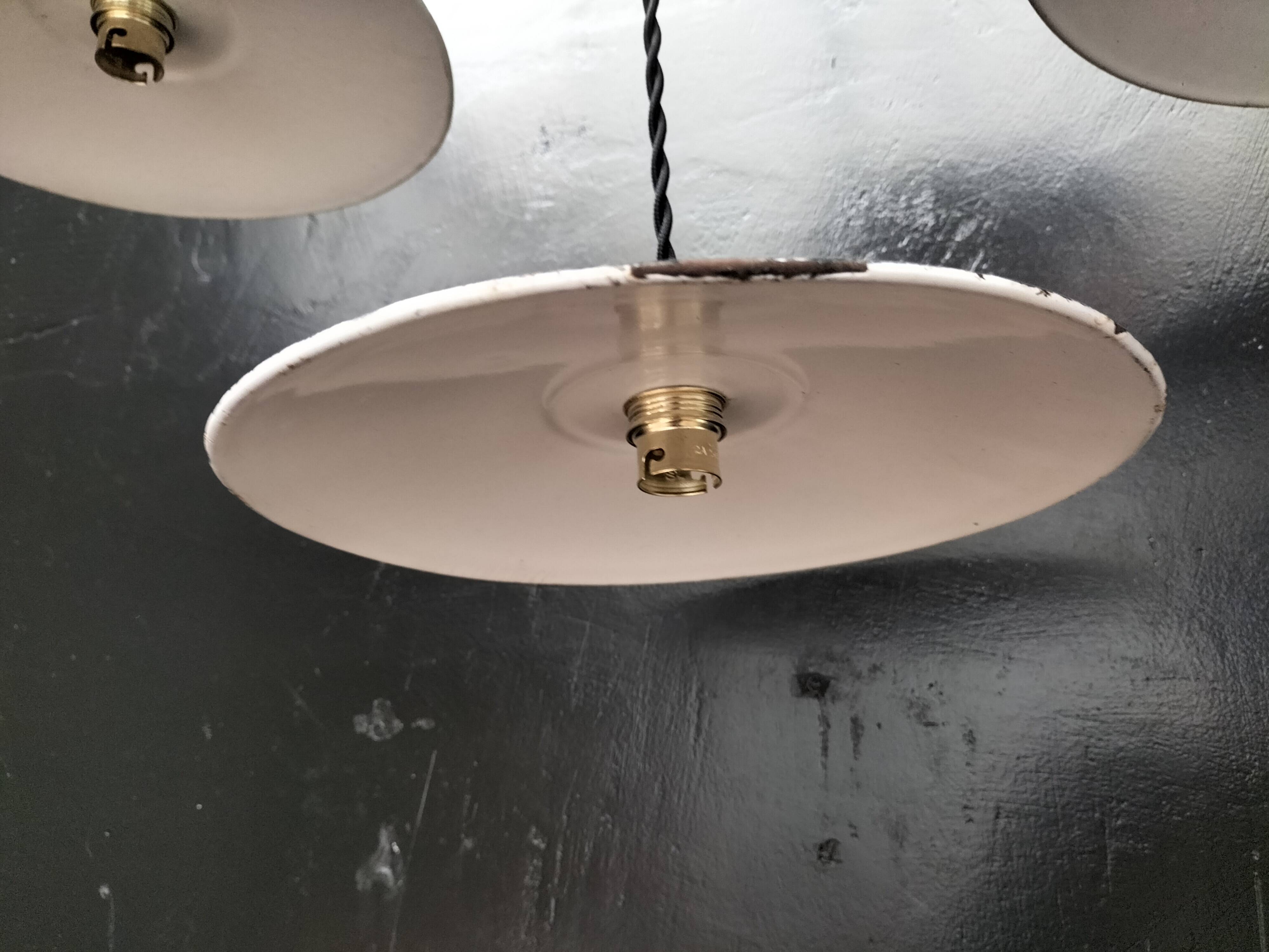 4 enameled sheet metal pendants