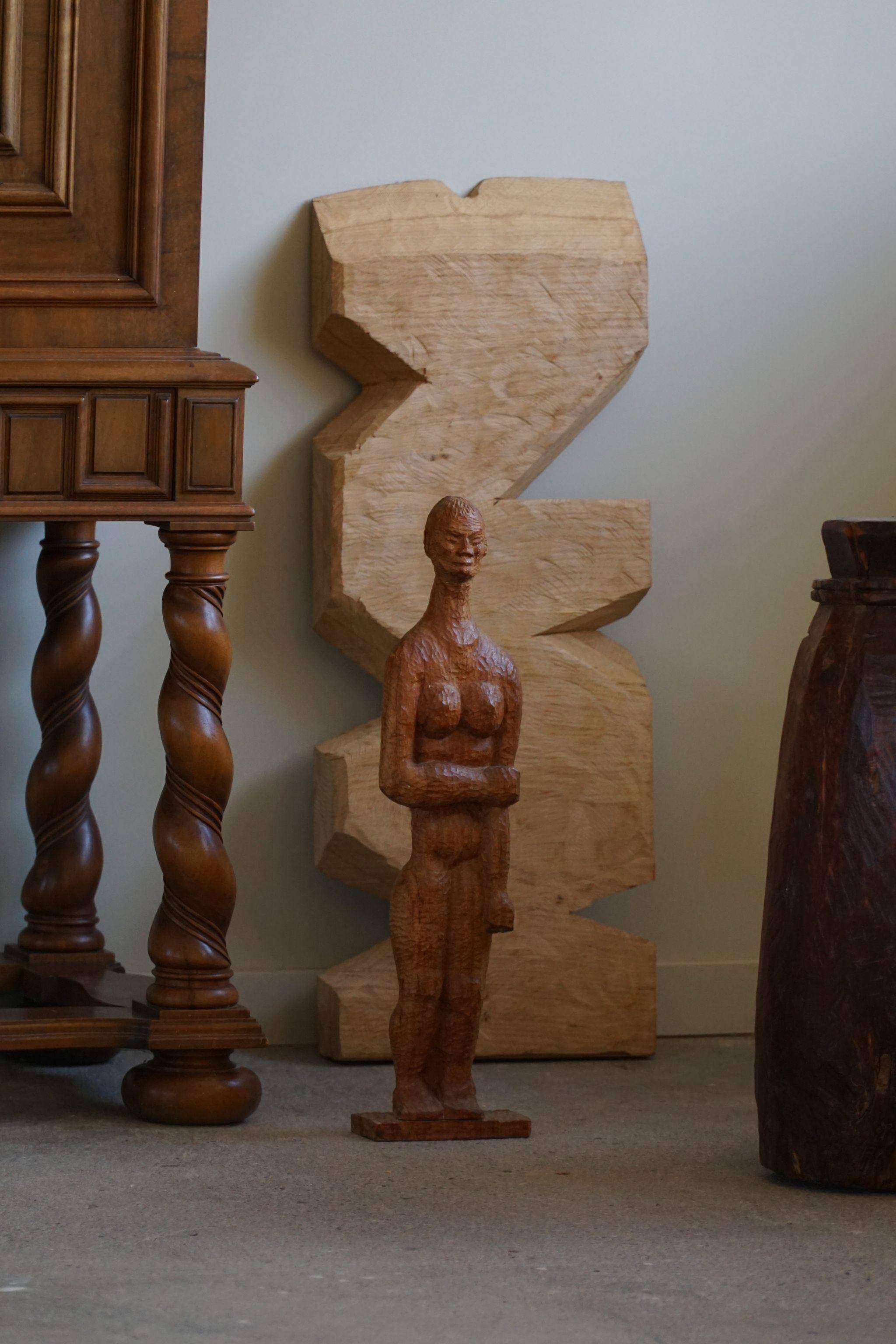 Mid-20th century Scandinavian folk art sculpture representing a human being.