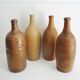 4 old stoneware bottles