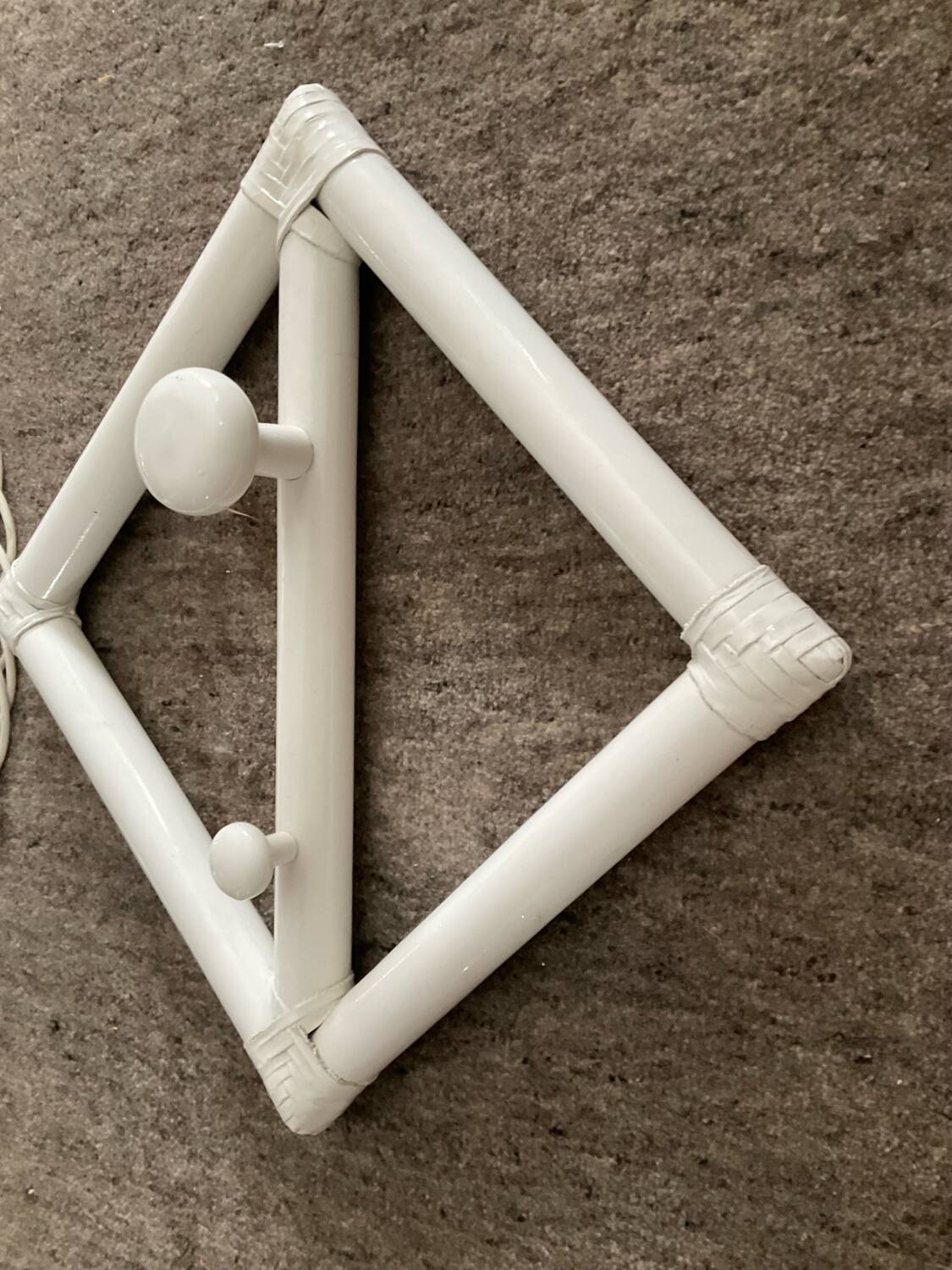 Rattan entrance set with mirror and 2 coat hooks.