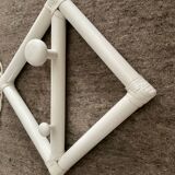 Rattan entrance set with mirror and 2 coat hooks.