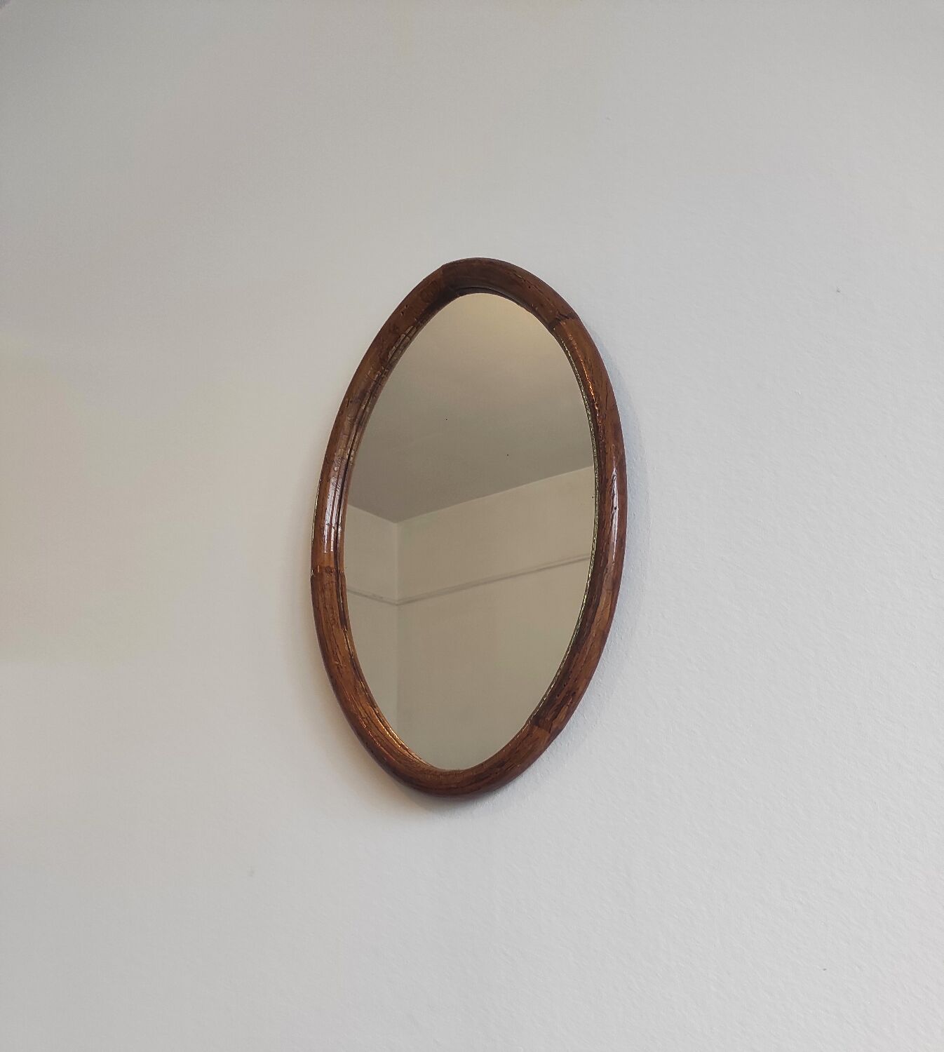 Vintage oval rattan mirror