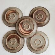 Set of 5 dessert plates by Jean Tessier, Le Cep, in pyrite stoneware.