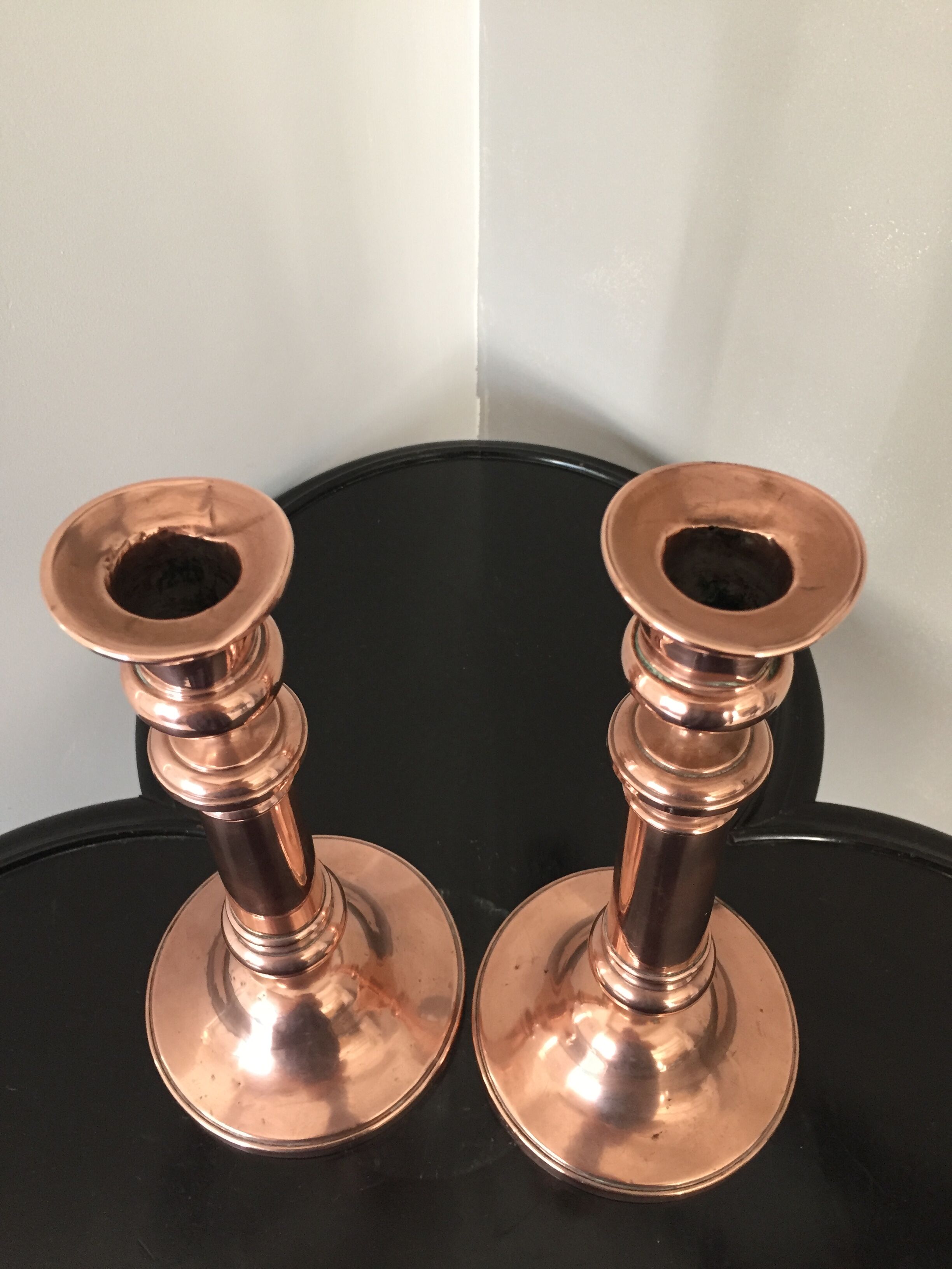 Pair of pink copper candlesticks