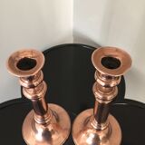 Pair of pink copper candlesticks