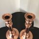 Pair of pink copper candlesticks