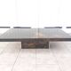 Table basse laquée à décor solaire