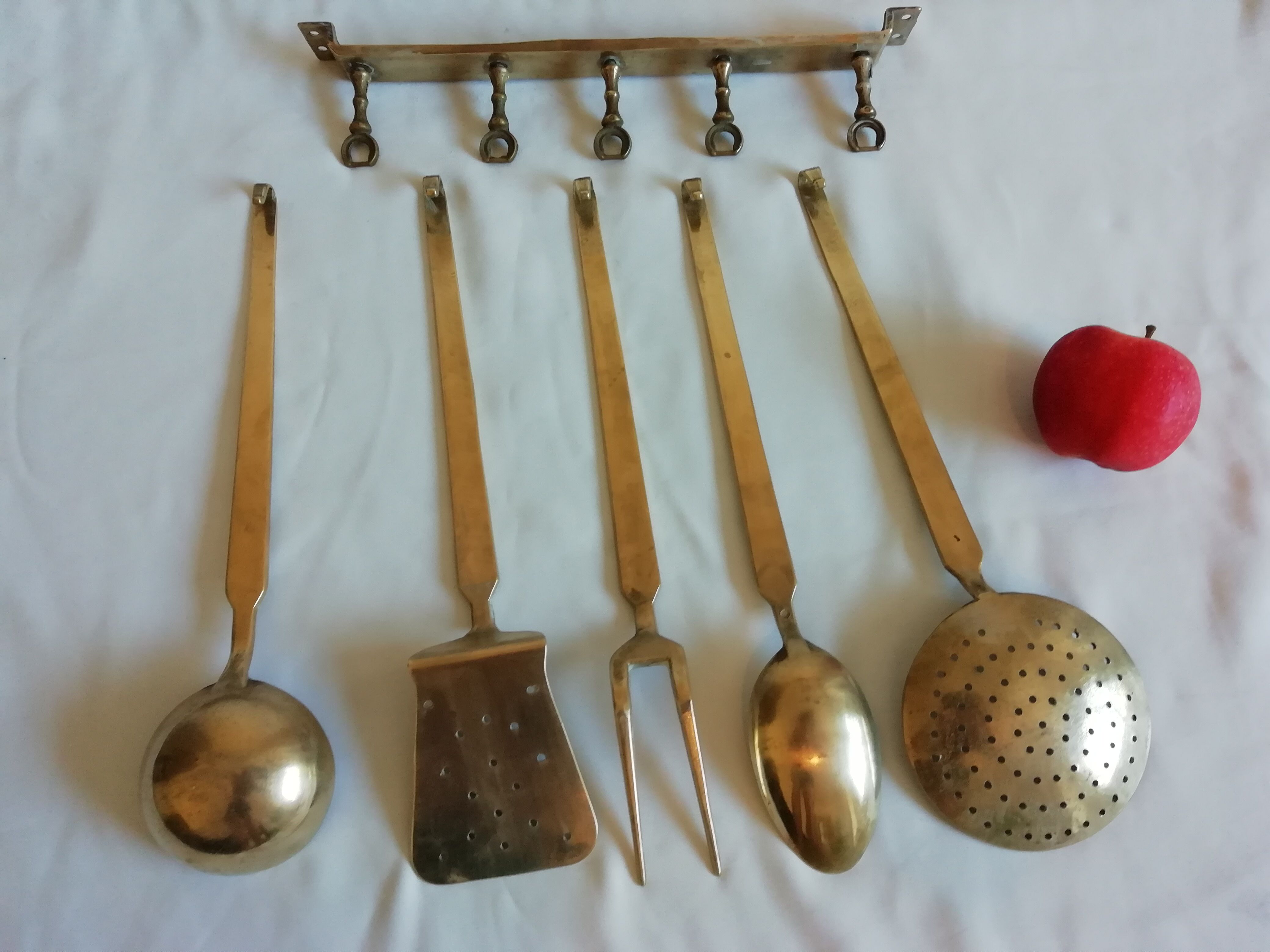 Set of brass kitchen utensils. Early XXeme