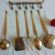Set of brass kitchen utensils. Early XXeme