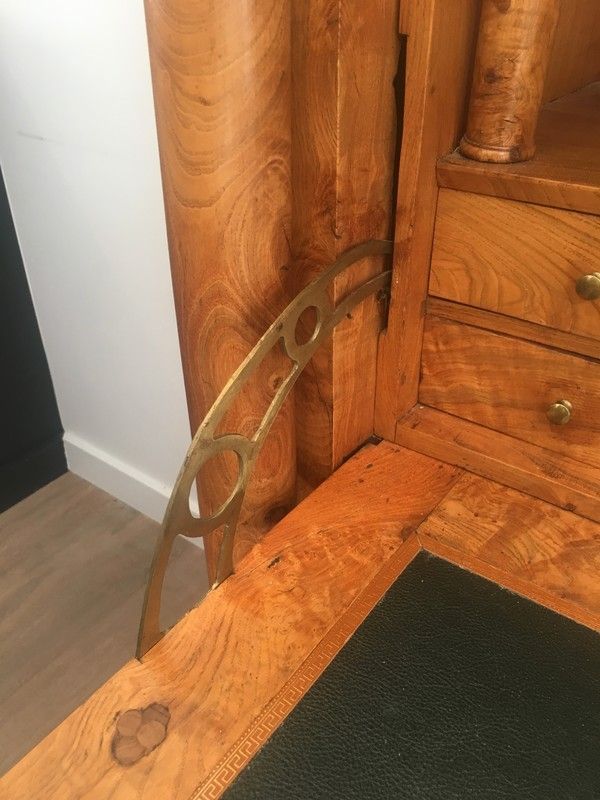 Empire-style secretary desk in burr walnut with detached columns, drop-front, and secret drawer