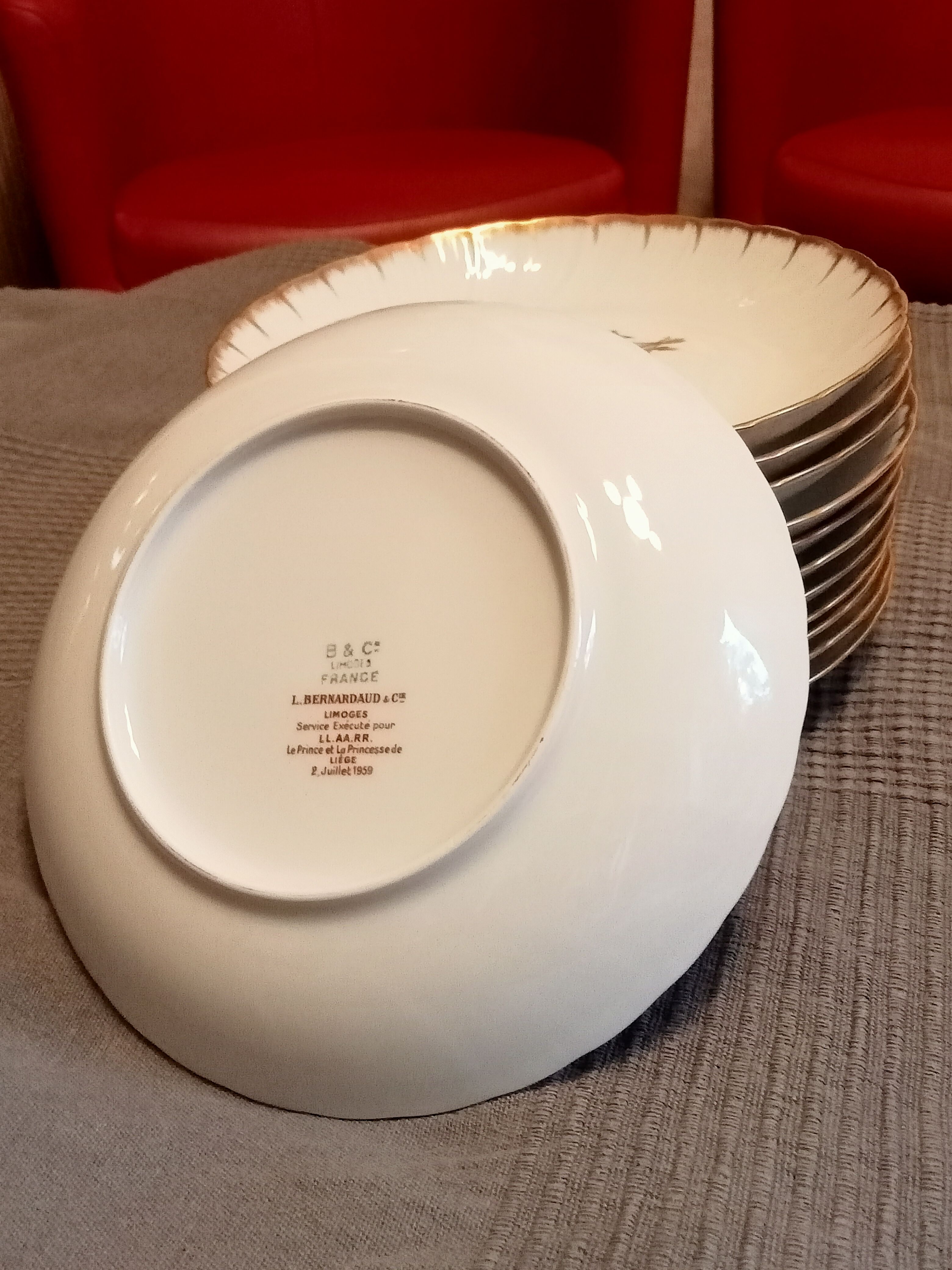 Limoges porcelain signed Bernardaud with gold border and central decoration country scenes