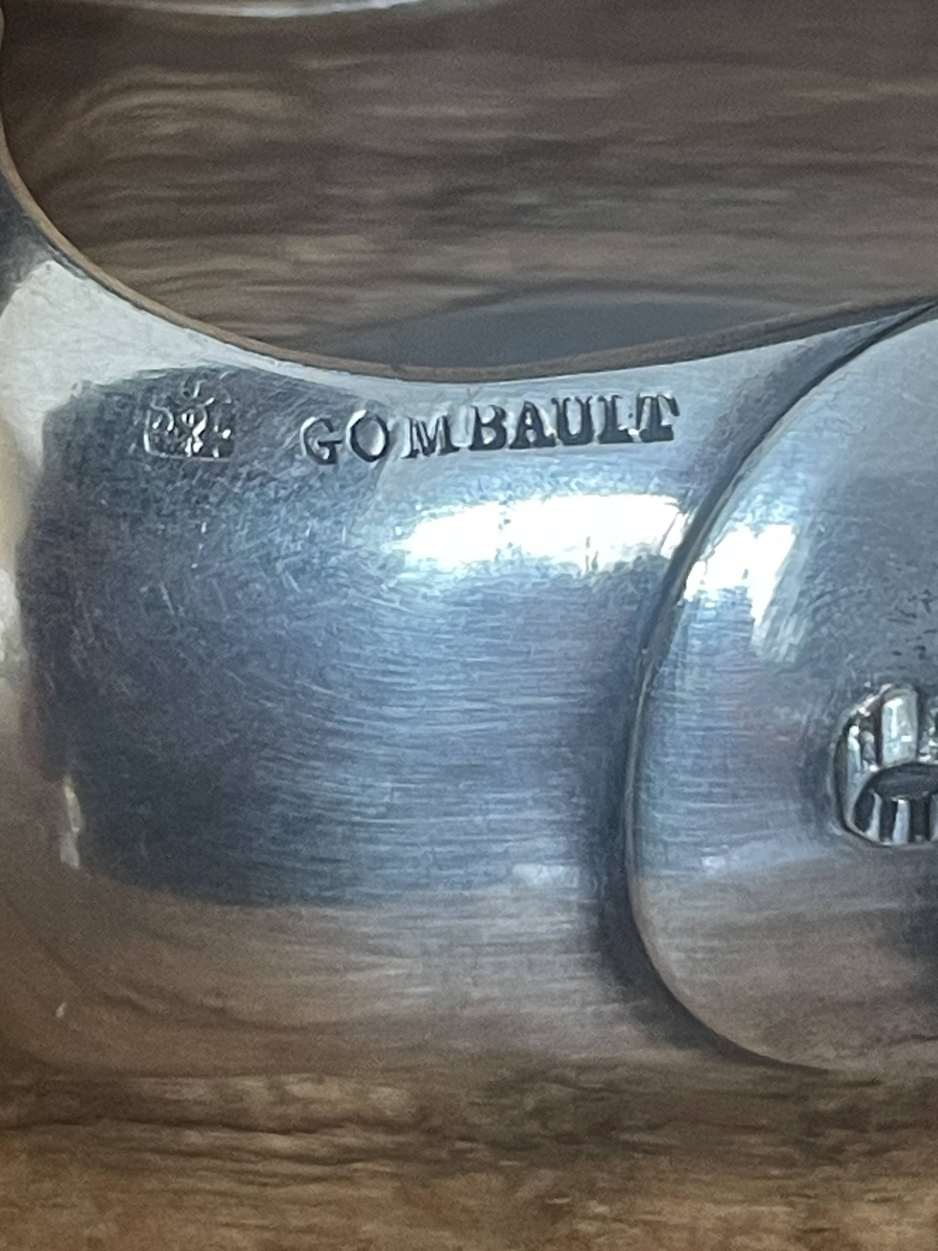 Silver metal sugar tongs from the Gombault house for tea time.