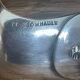 Silver metal sugar tongs from the Gombault house for tea time.