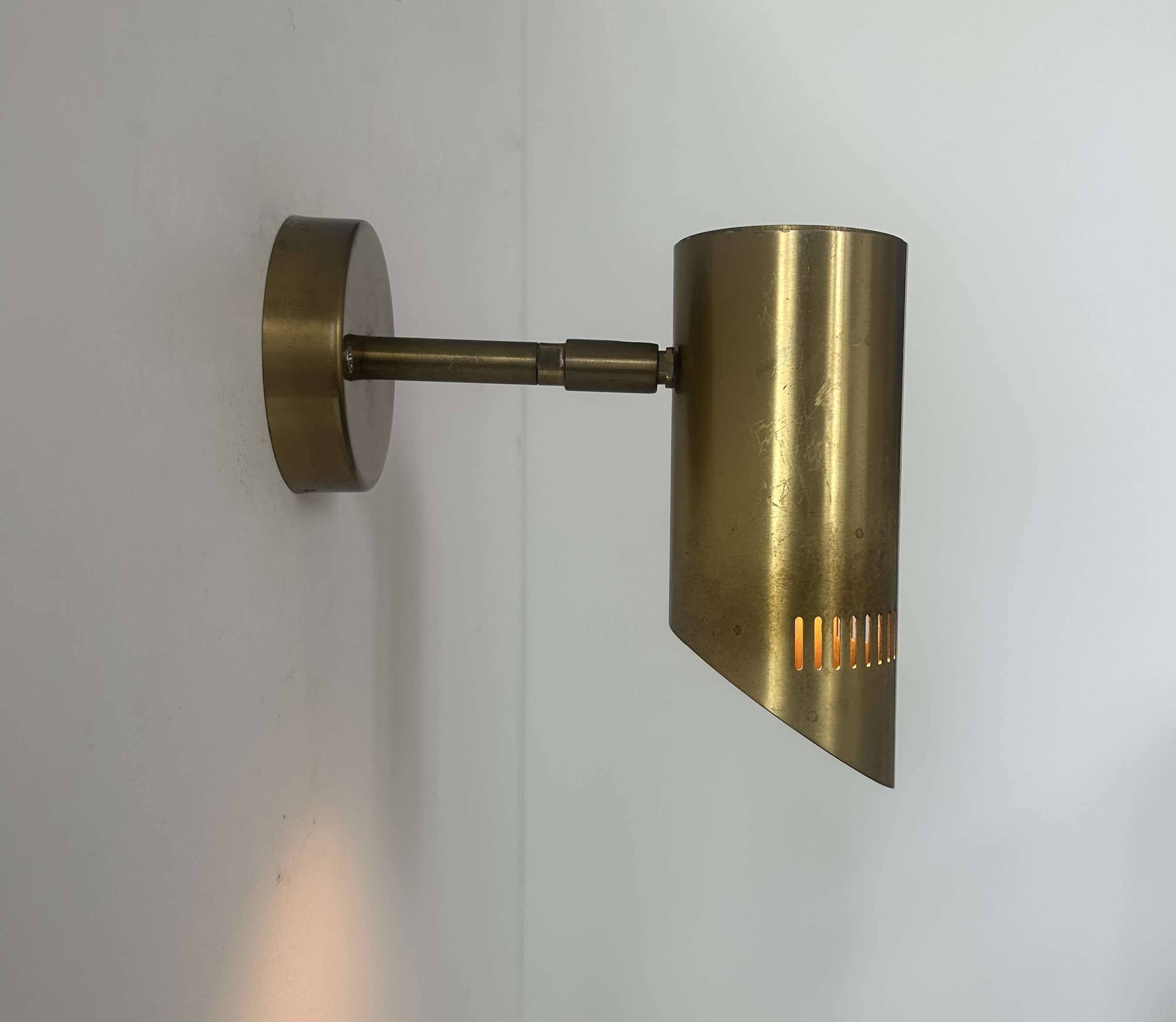 Vintage adjustable wall light, solid perforated brass, France 1960