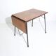 Vintage folding table in teak by Arne Jacobsen for Fritz Hansen, Denmark, 1950s.