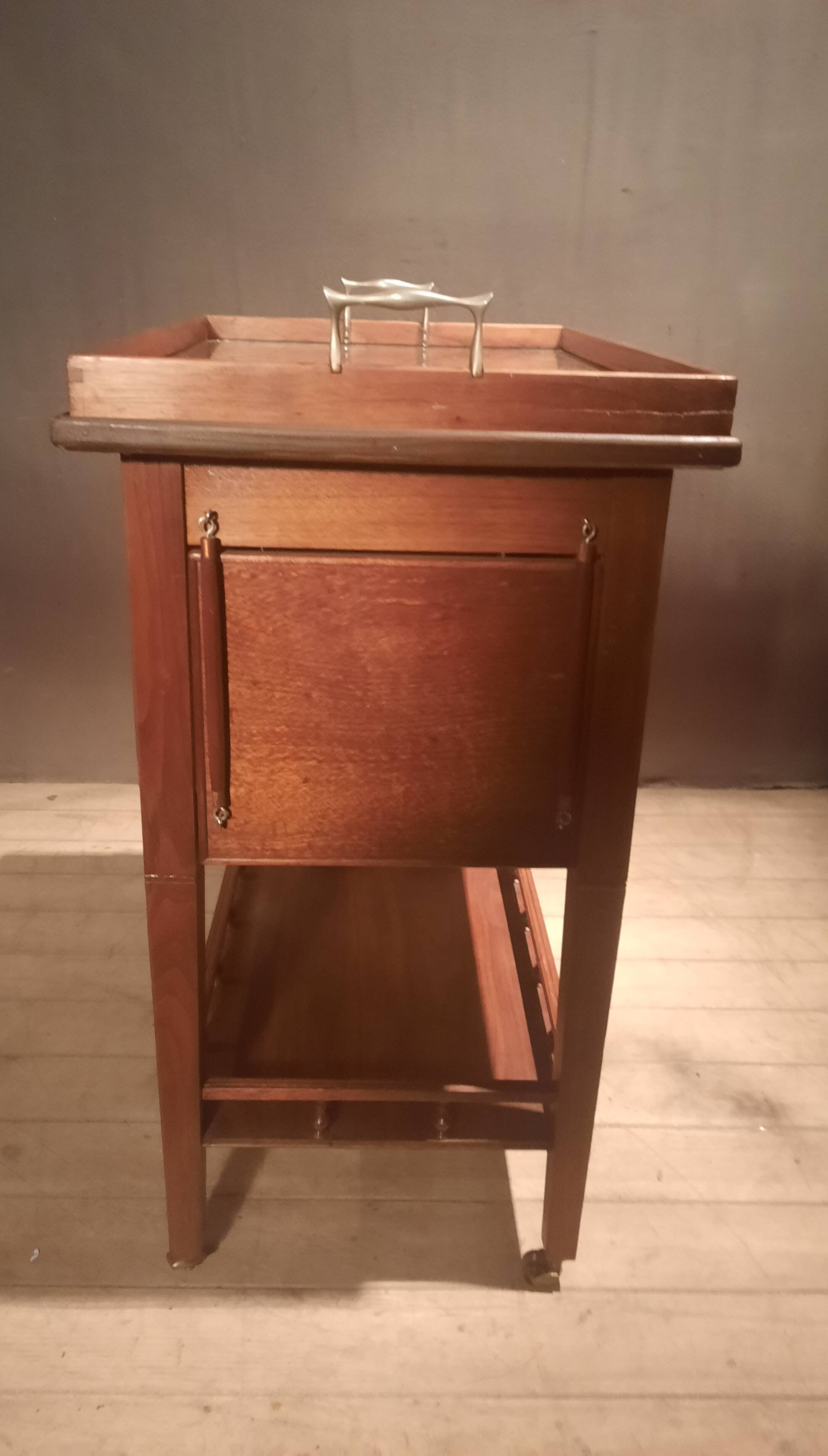 Sideboard with four drop-leaves