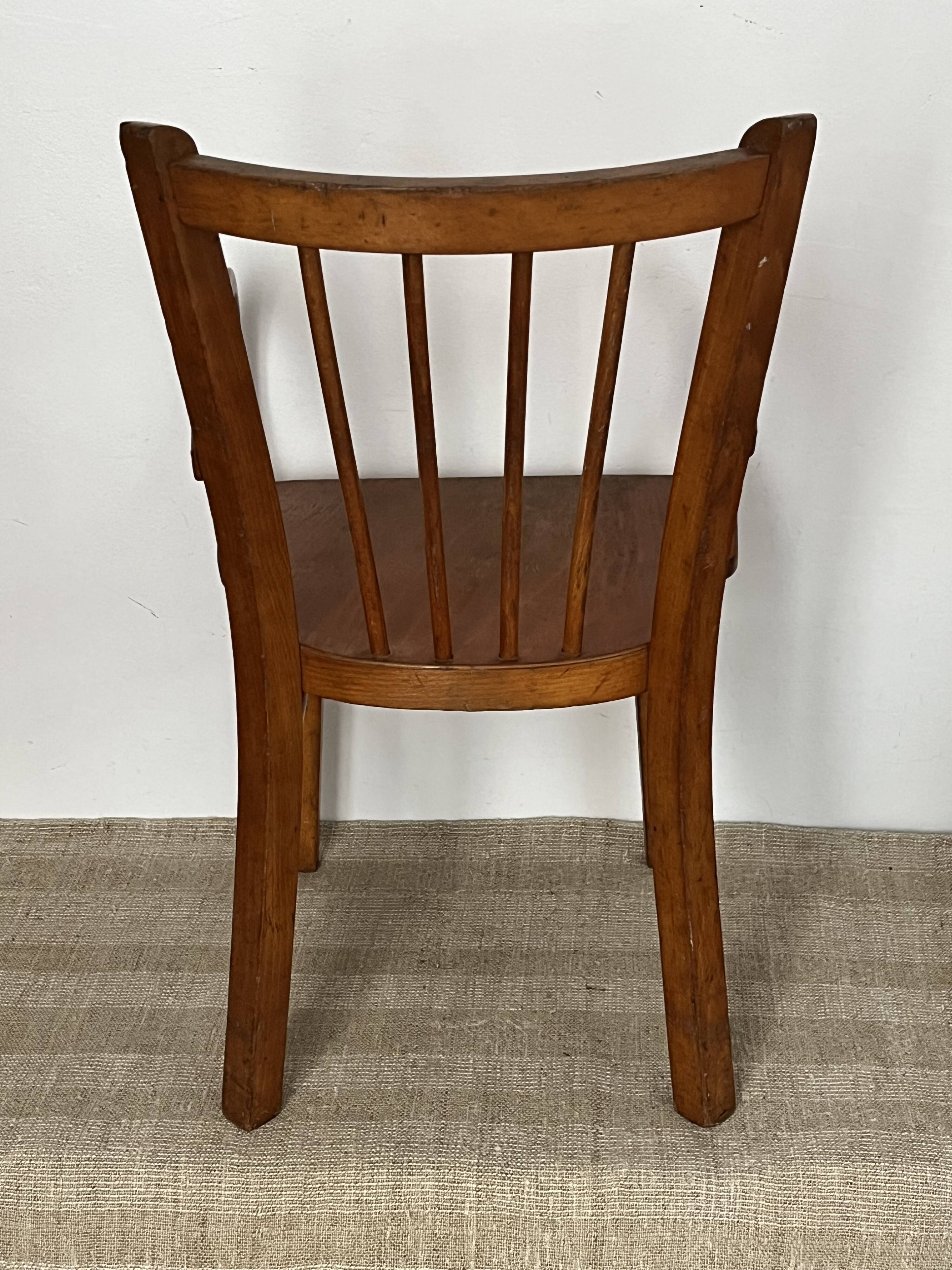 Curved wooden child's armchair - early 20th century