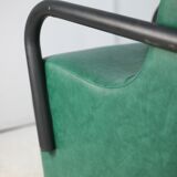 Pair of armrest heaters. Steel and green imitation leather. France, circa 1980