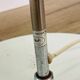Chrome and white metal floor lamp, circa 1970.