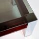 Vintage Italian coffee table with a smoked glass top and chrome structure.