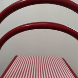 Red lacquered tubular chair