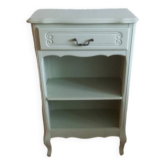Small pastel green bibus with drawer.