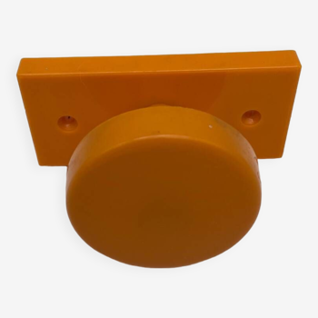 Orange plastic coat hook from the 70s