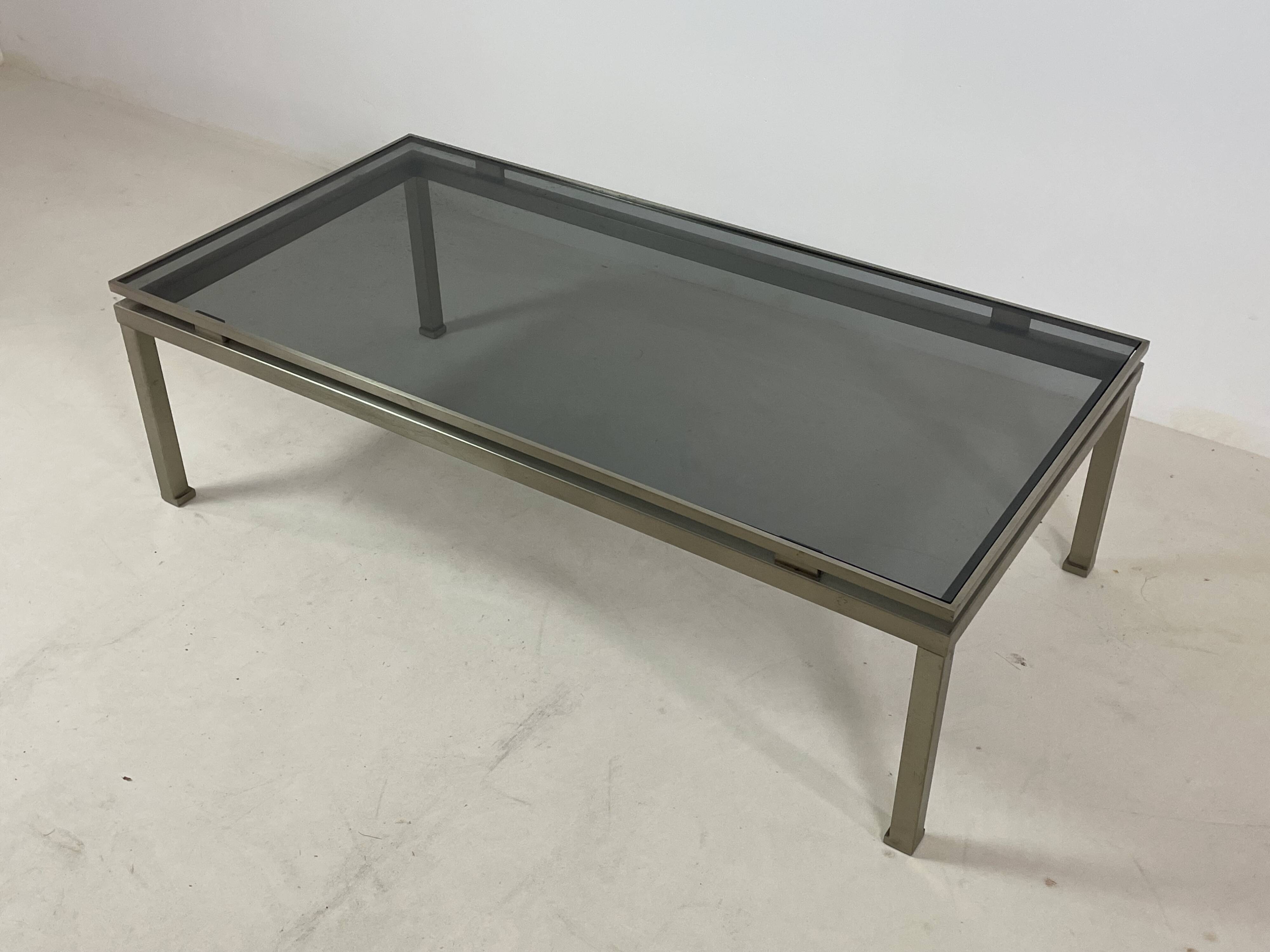 Brass coffee table with smoked glass top by Guy Lefevre, 1970s