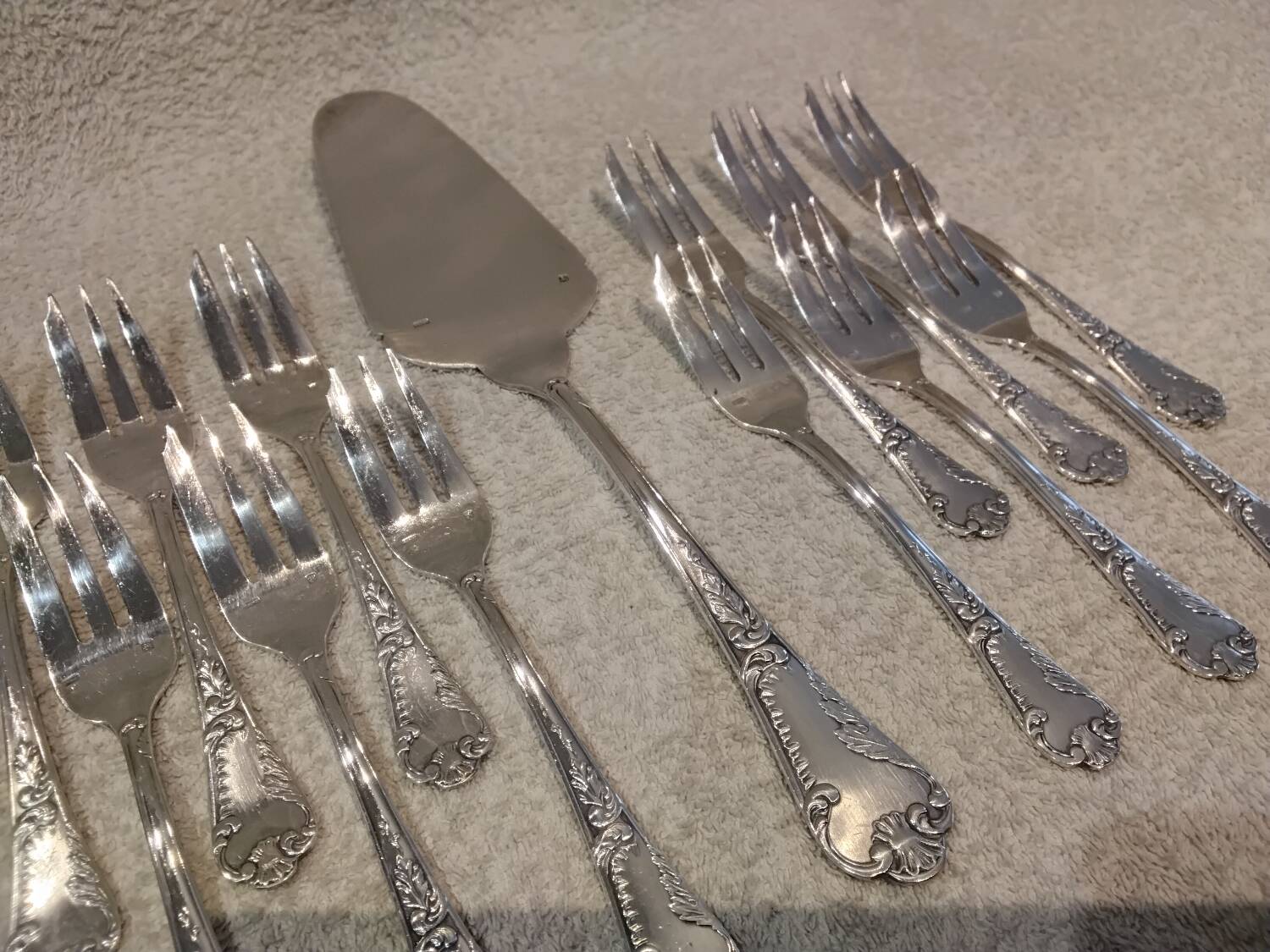 12 cake forks, pie server, silversmith Frionnet Dubarry