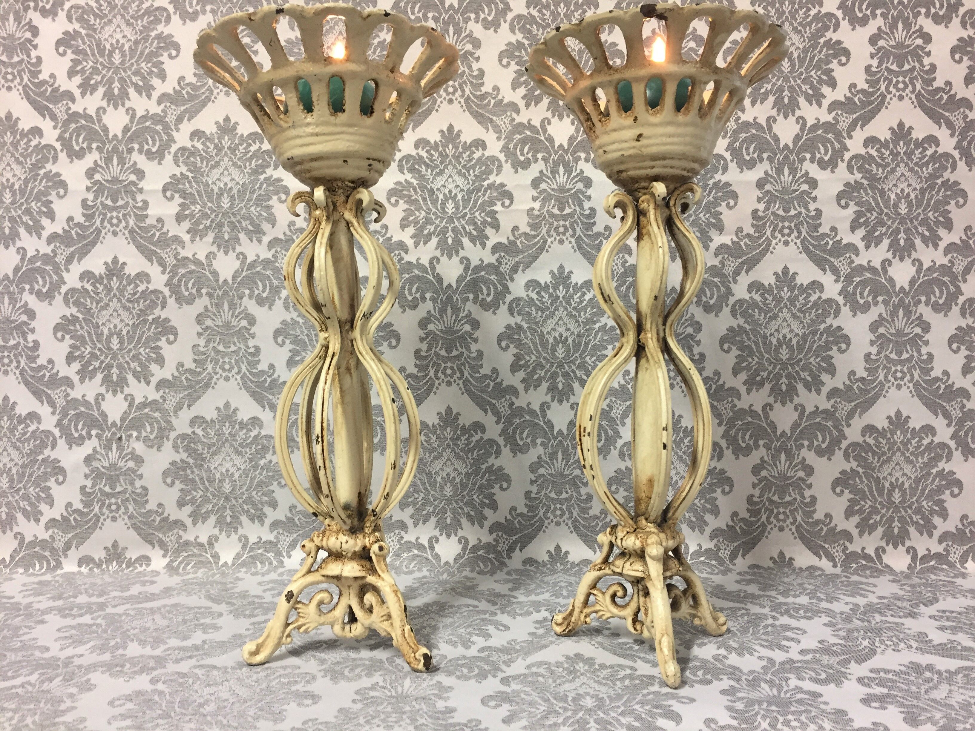 Pair of candlesticks patinated cast iron renaissance design