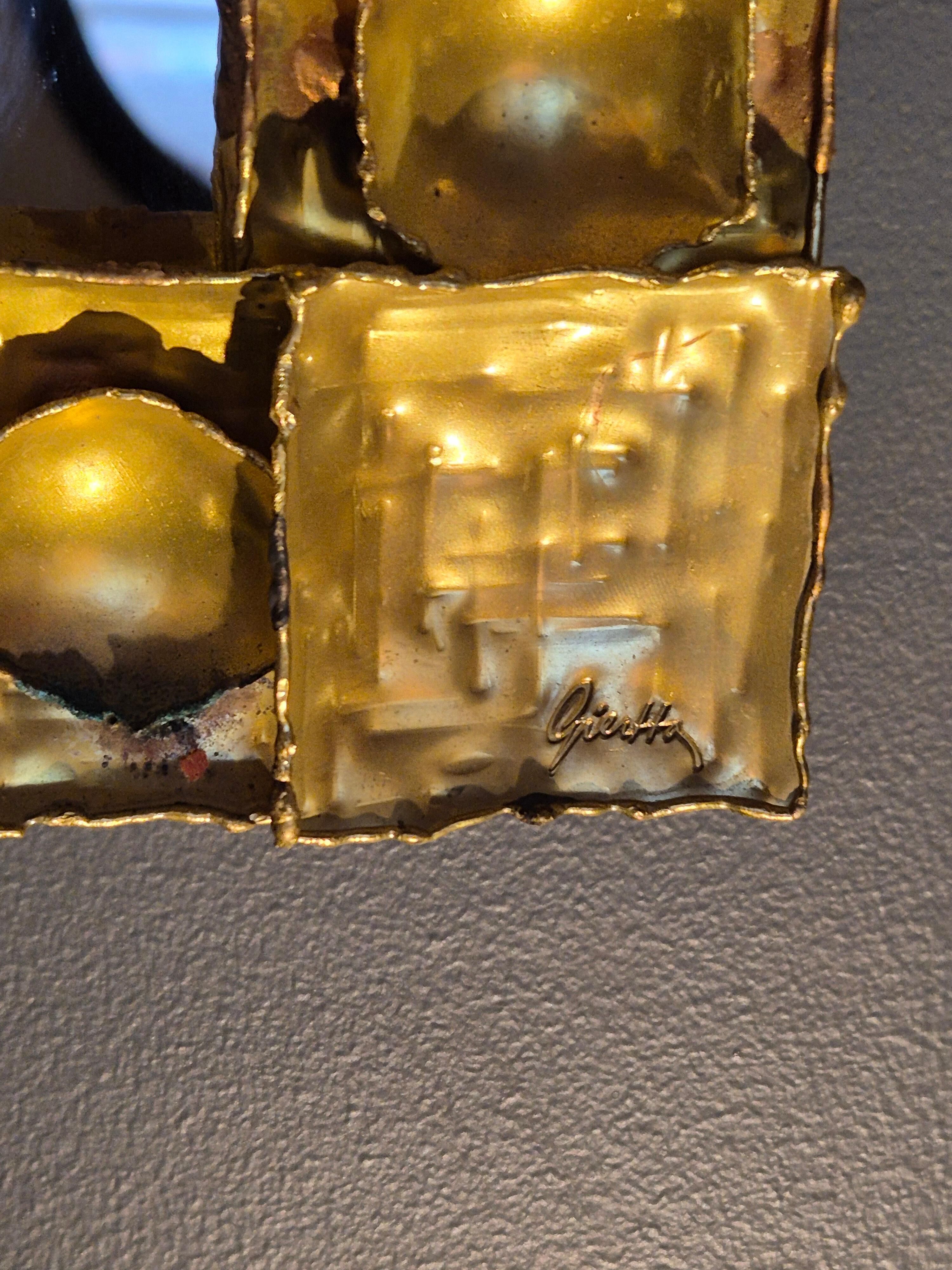 Brutalist brass mirrors by Claës E. Giertta