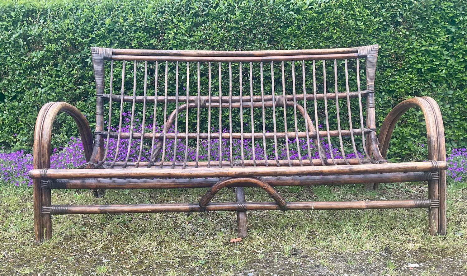 Vintage rattan bench from the 60s