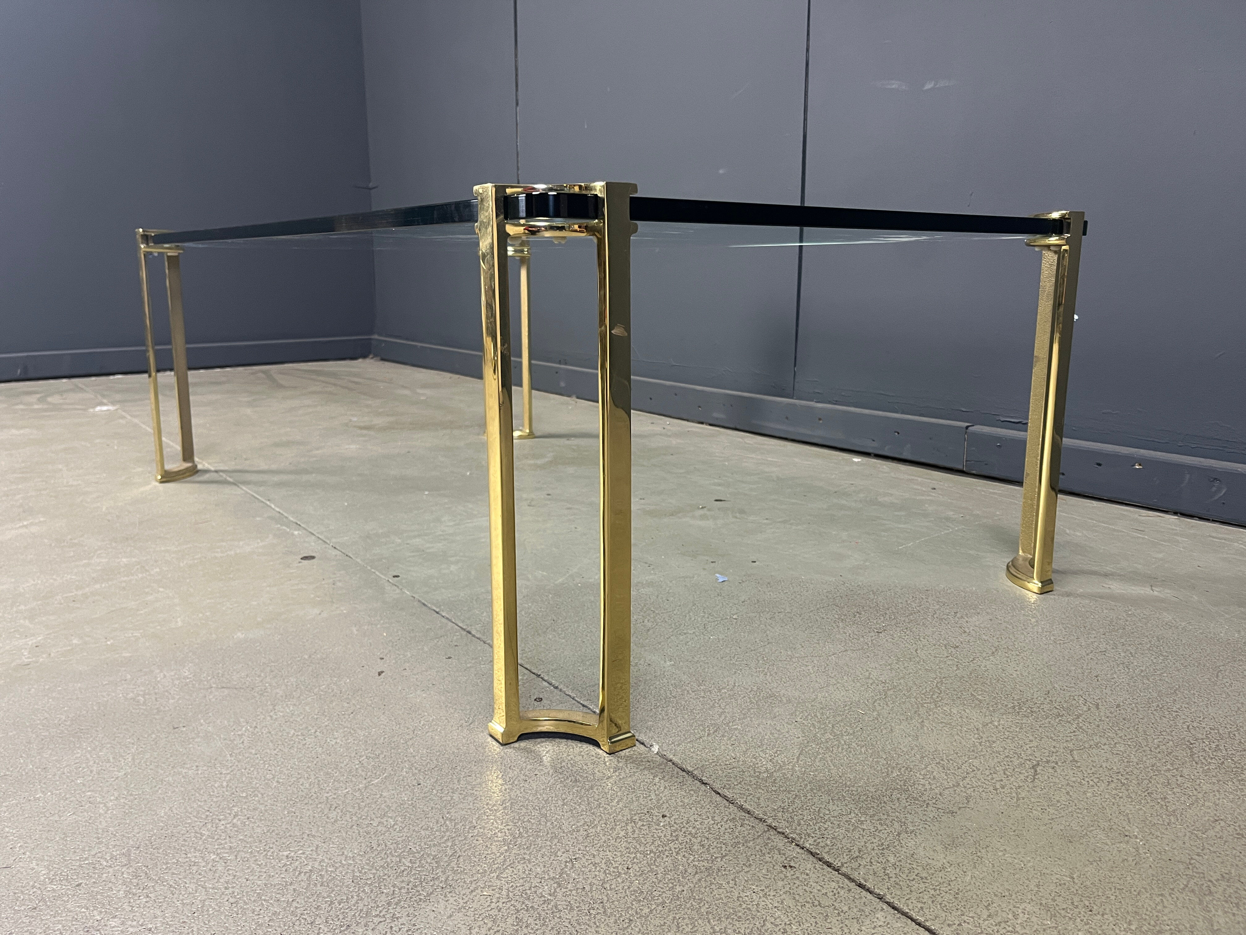 Peter Ghyczy style coffee table in brass and glass