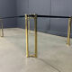 Peter Ghyczy style coffee table in brass and glass