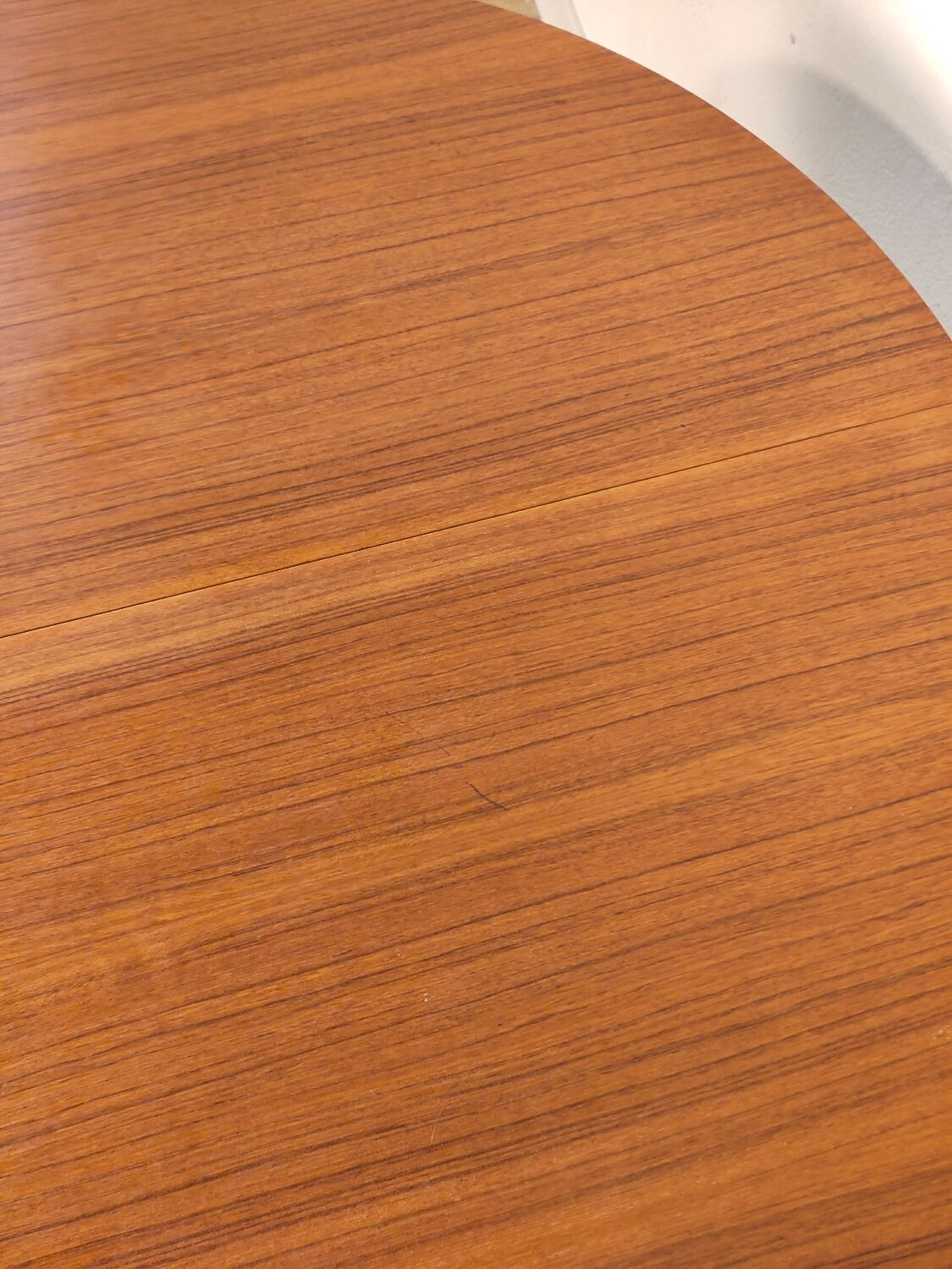 Round Scandinavian teak table