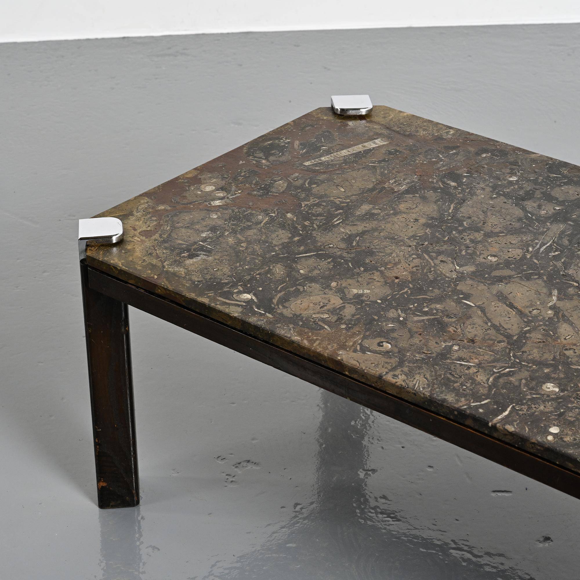 Fossil stone and chrome metal coffee table, Fossile Collection, Switzerland, circa 1980.