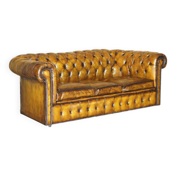 Vintage Chesterfield leather sofa bed, fully restored, circa 1940.