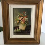 Tableau à fleurs, signé Roger