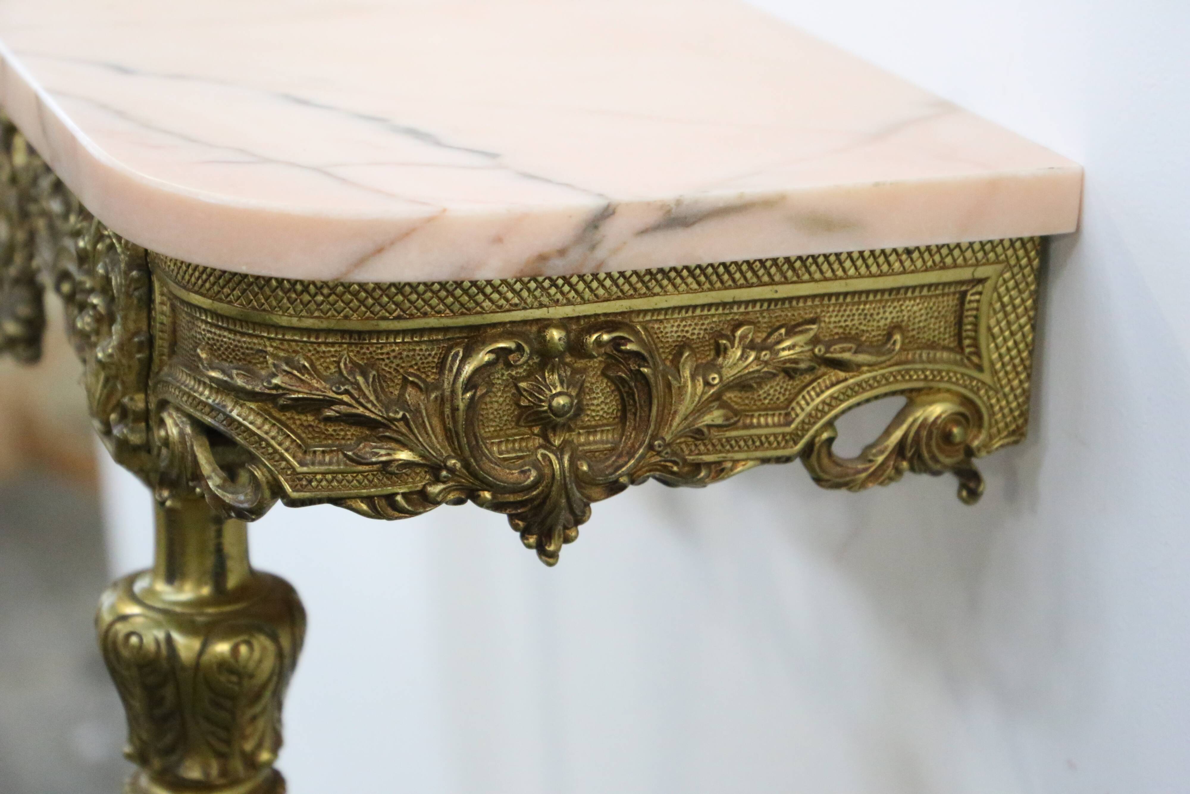 Console in brass and pink alabaster